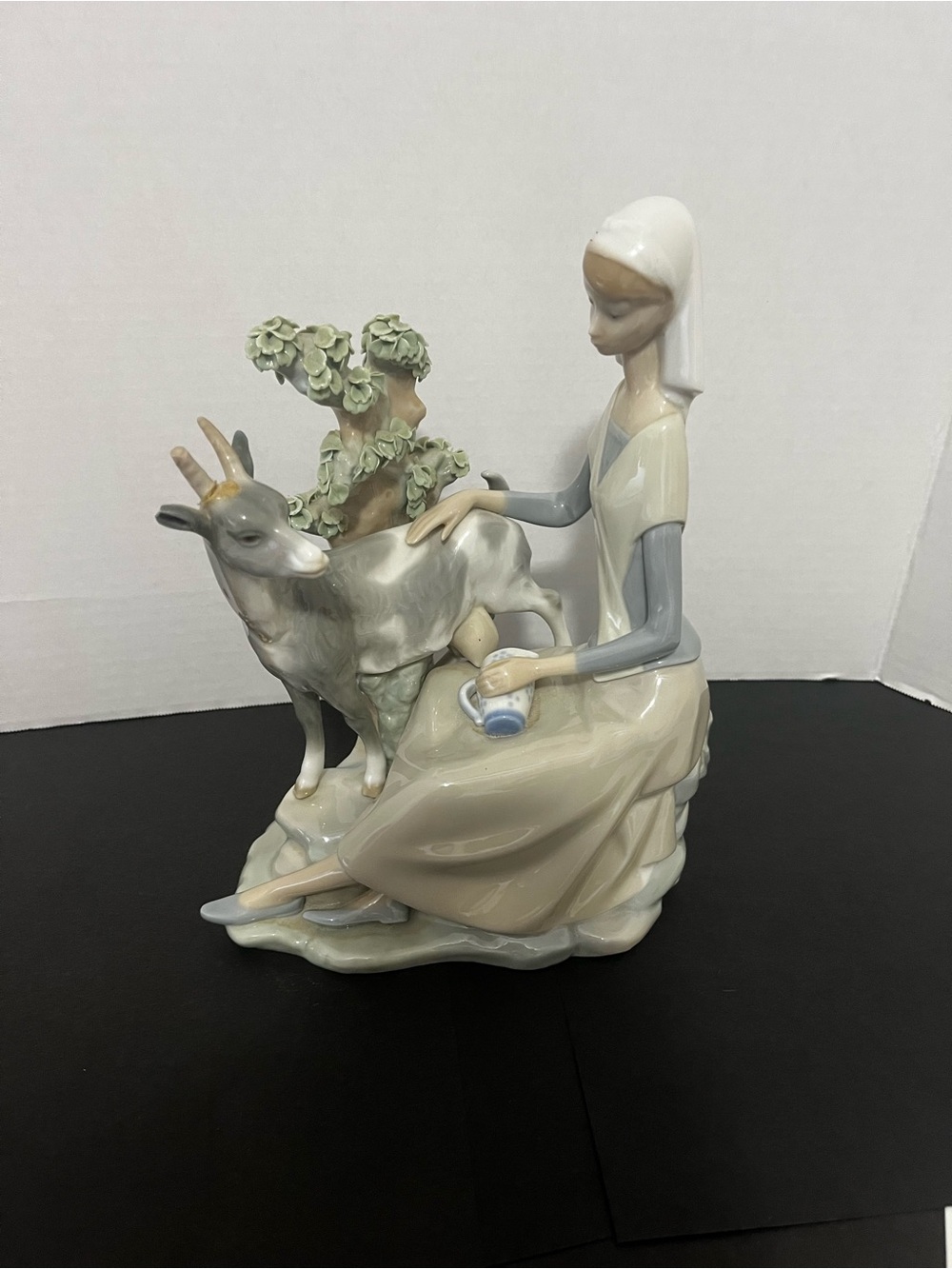 Lladro Porcelain Figurine in Cream, Gray, Soft Green